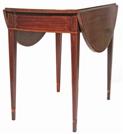 Appraisal: Mahogany inlaid Pembroke tableThe rectangular top above a frieze with