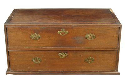 Appraisal: An th century mahogany chest on later stand the quarter