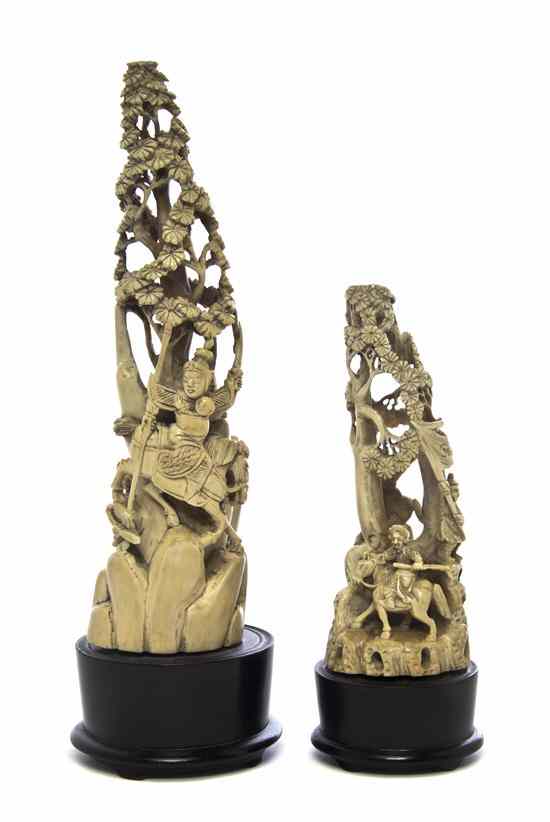 Appraisal: Two Pierce Carved Ivory Figures of tusk form depicting a