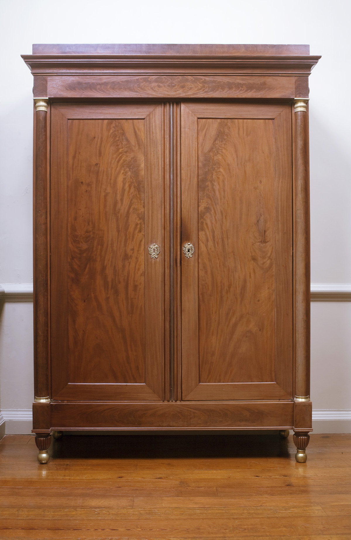 Appraisal: IMPORTANT PAIR OF NEW YORK CLASSICAL MAHOGANY WARDROBES WITH ORMOLU