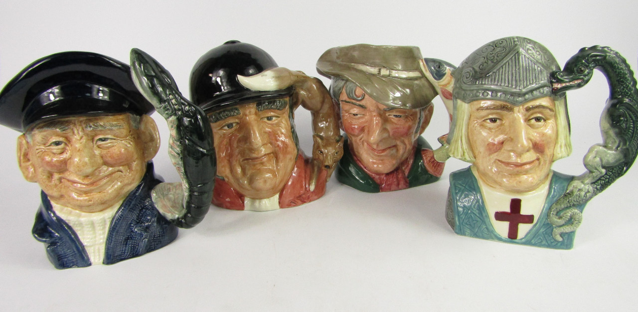 Appraisal: Four large Royal Doulton pottery character jugs comprising St George