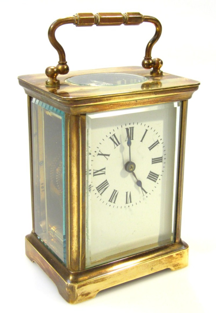 Appraisal: A thC carriage clock the cm plate with Roman numerals