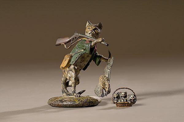 Appraisal: VIENNESE COLD-PAINTED BRONZES OF CATS one depicting a hunter dressed