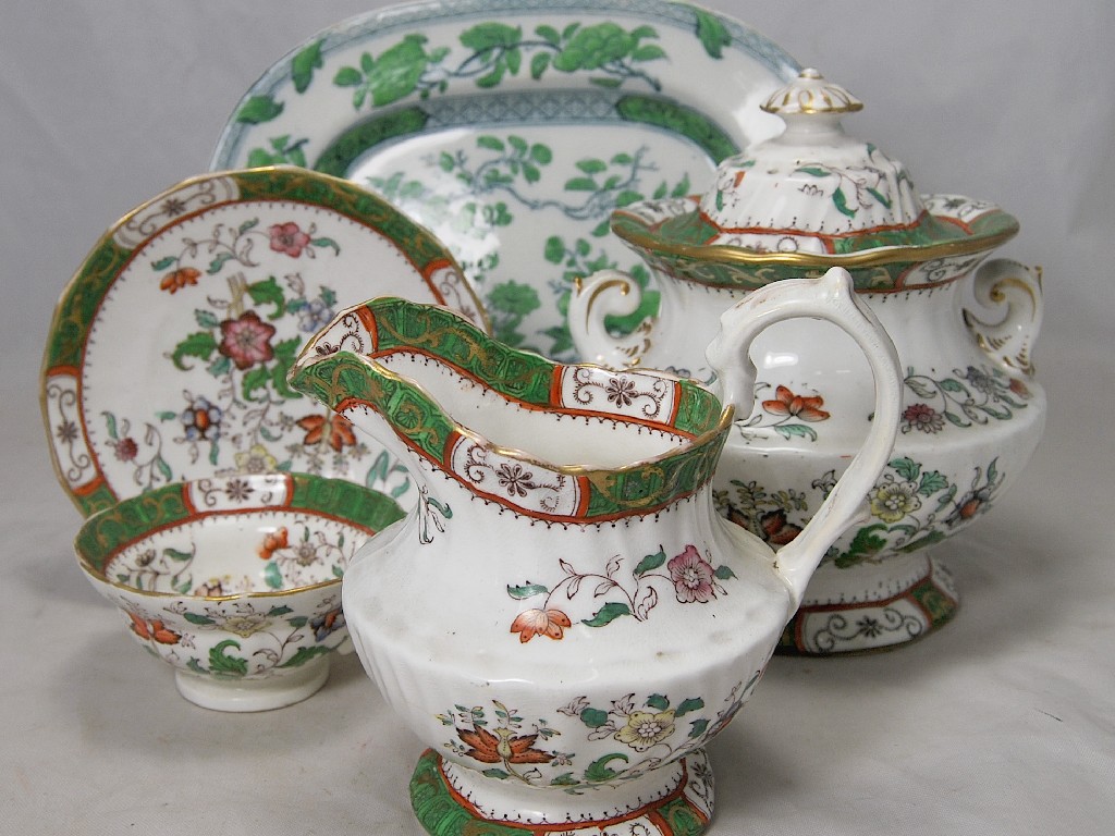 Appraisal: A Victorian Staffordshire china tea service with green and gilt