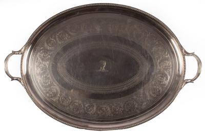 Appraisal: A plated oval tray Elkington Co with central crest beaded