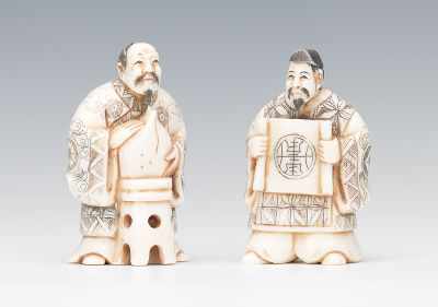 Appraisal: Two Carved Ivory Netsuke of Scholars Both male figures wearing