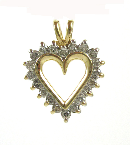 Appraisal: DIAMOND AND FOURTEEN KARAT GOLD PENDANT The open-heart pendant set