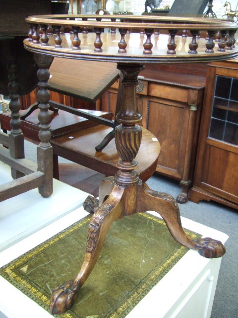 Appraisal: A th century style mahogany occasional table the circular top