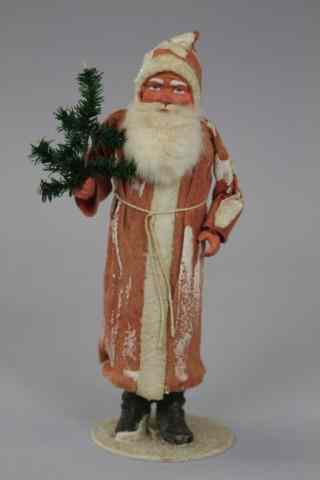 Appraisal: a FATHER CHRISTMAS CANDY CONTAINER Germany hand painted composition head