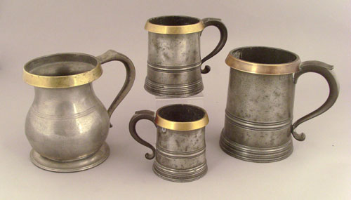 Appraisal: Three English pewter measures mid late th c with brass