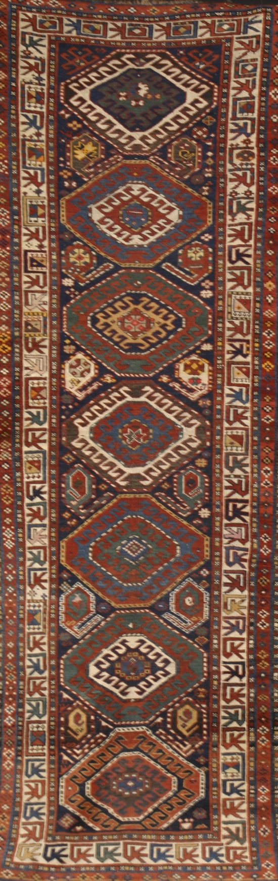 Appraisal: Kazak Rug Circa Blue ground with rosette and boteh field