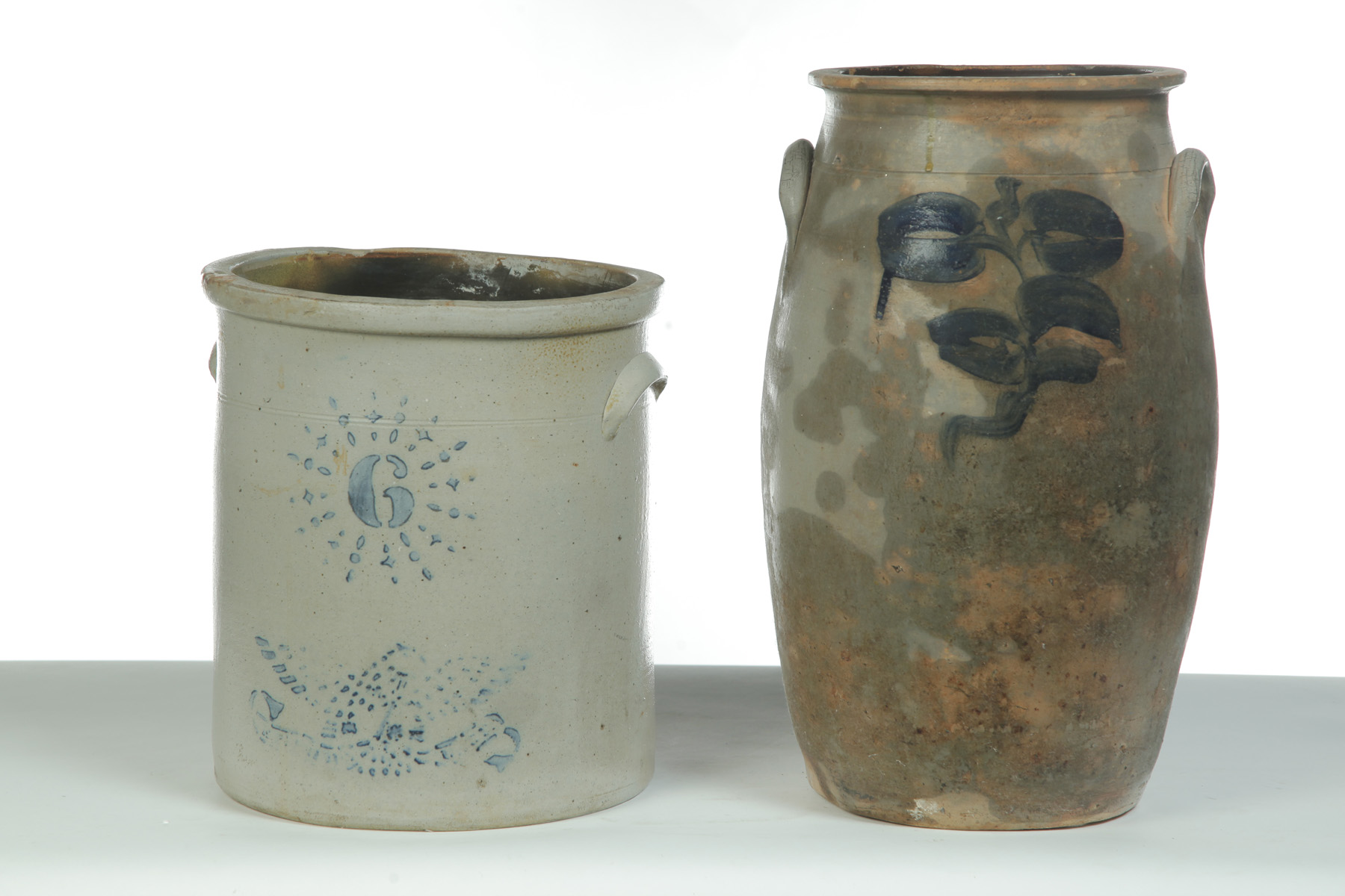 Appraisal: TWO HANDLED STONEWARE JARS WITH COBALT DECORATION American nd half-