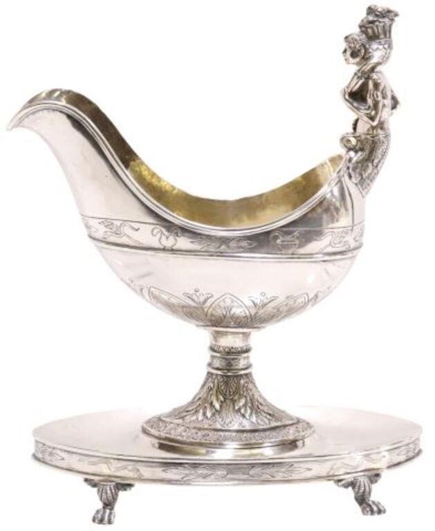 Appraisal: Continental silver content unknown sauceboat and stand apparently unmarked handle