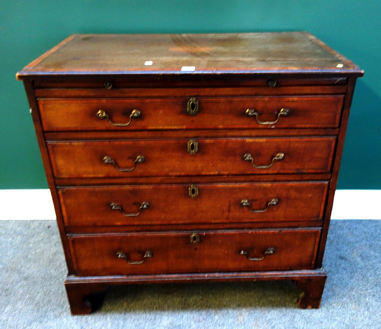 Appraisal: An th century and later inlaid mahogany chest the brushing