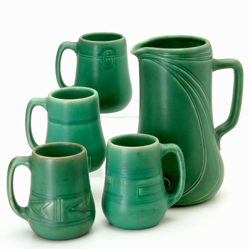 Appraisal: ROOKWOOD Assembled tankard and mug grouping a Carved Matt tankard