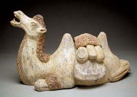 Appraisal: EARLY TANG POTTERY CAMEL Extremely rare and superbly modeled Chinese