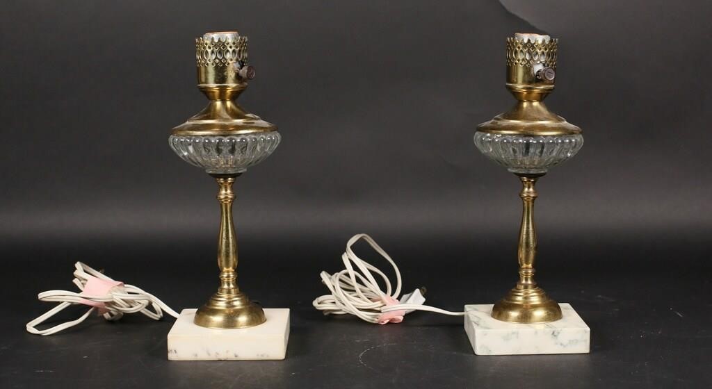 Appraisal: Victorian style brass and glass electrified oil lamps Mounted on