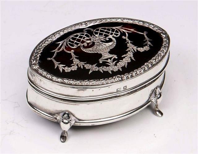 Appraisal: AN EDWARDIAN SILVER TRINKET BOX oval hinged lid with inlaid