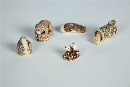 Appraisal: FIVE NETSUKES Japan th century ivory Monkey two fish carp