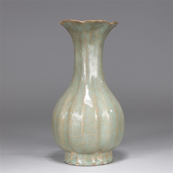 Appraisal: Chinese celadon glazed ceramic vase the body of ribbed form