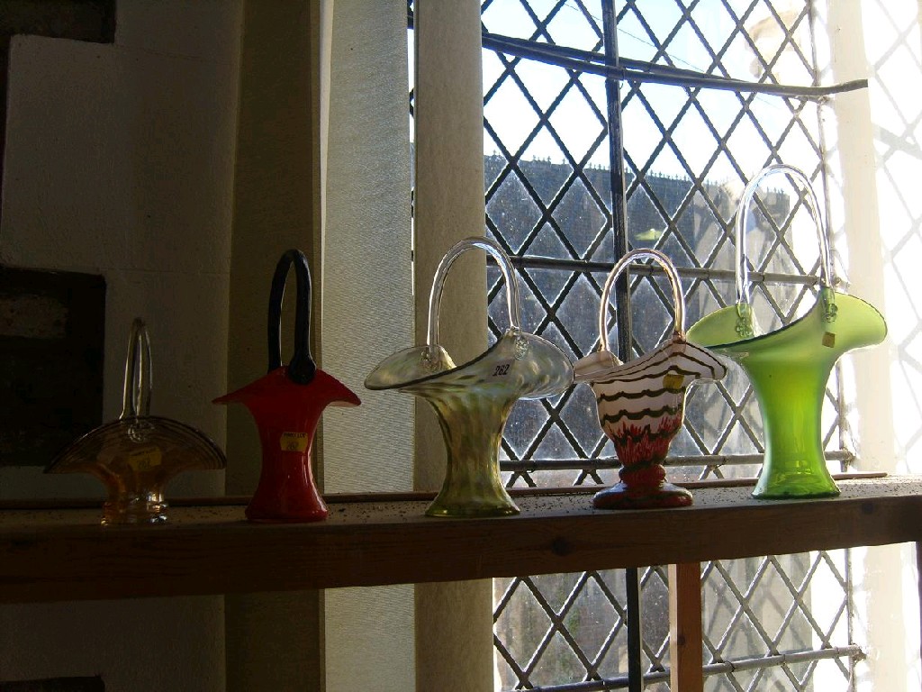 Appraisal: A collection of various glass baskets with marbled and other