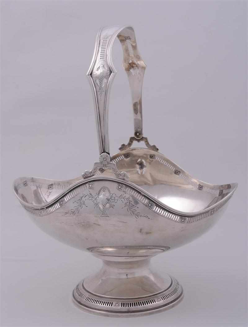 Appraisal: AMERICAN SILVER CAKE BASKET The boat-form bowl with waved rim