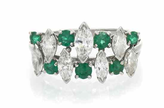 Appraisal: A Platinum Emerald and Diamond Ring Oscar Heyman containing seven