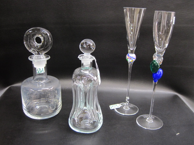 Appraisal: GLASS LIQUOR DECANTERS CHAMPAGNE GOBLETS pieces The two clear glass