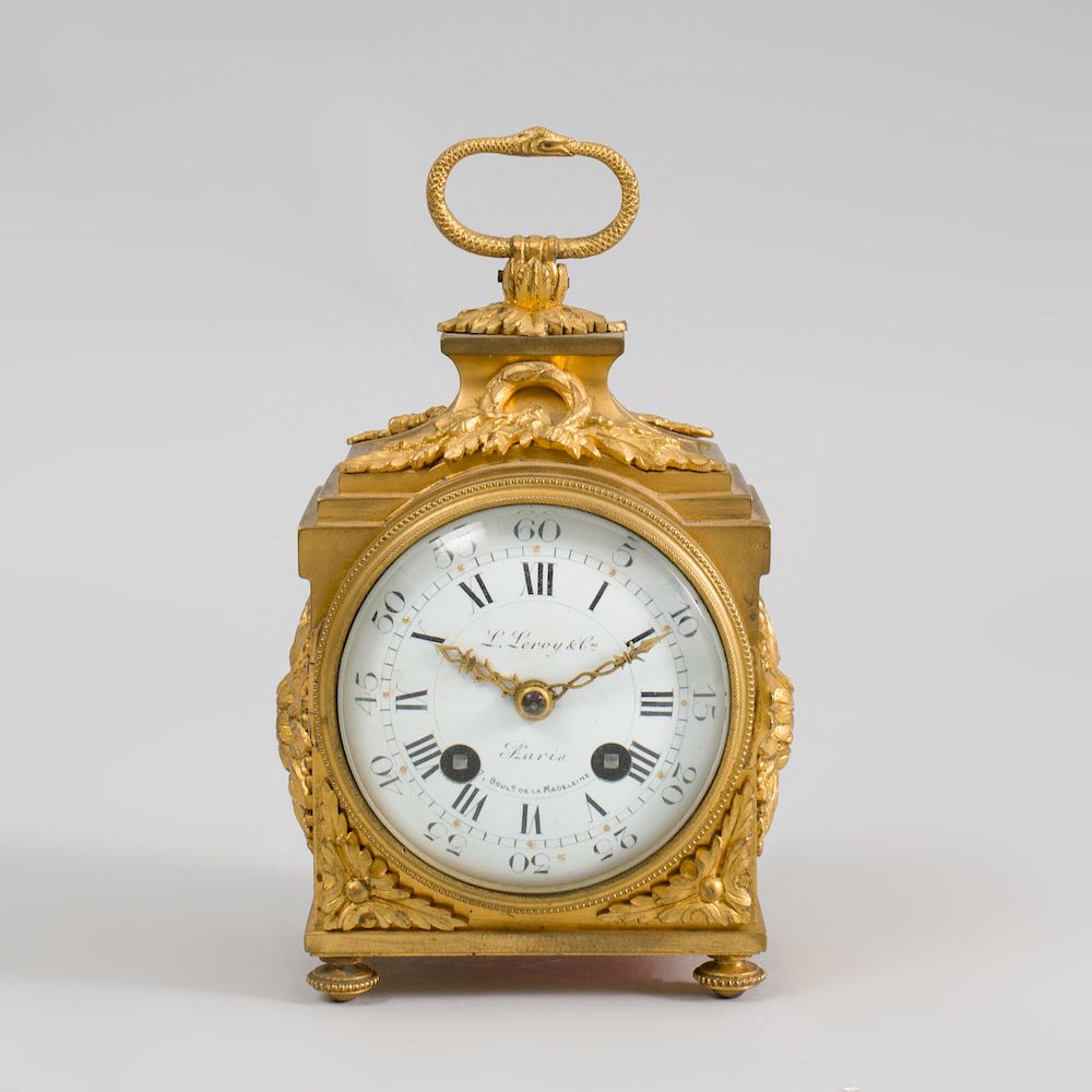 Appraisal: Louis XVI Ormolu Travel Clock The enamel dial inscribed 'L