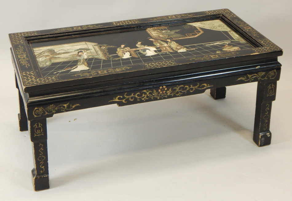 Appraisal: A Chinese lacquer coffee table the top decorated with figures