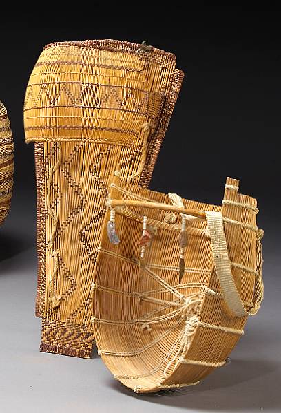 Appraisal: Two basketry cradles Including a Yokut or Western Mono example