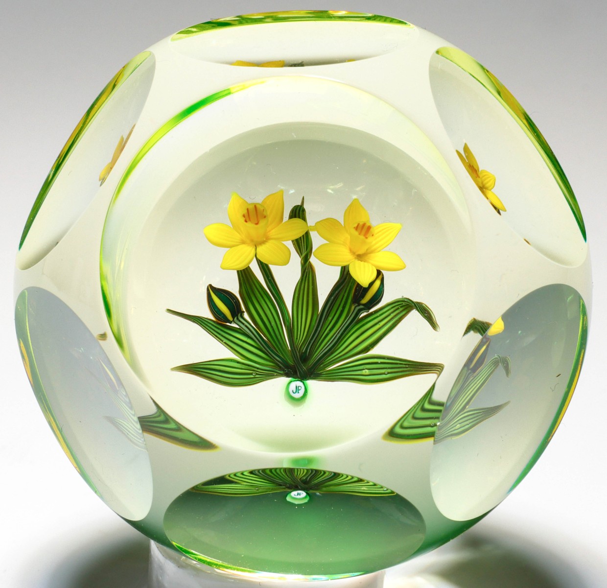 Appraisal: A JOHNE PARSLEY FACETED PAPERWEIGHT WITH DAFFODILSJohne ParsleyDaffodils with Leaves