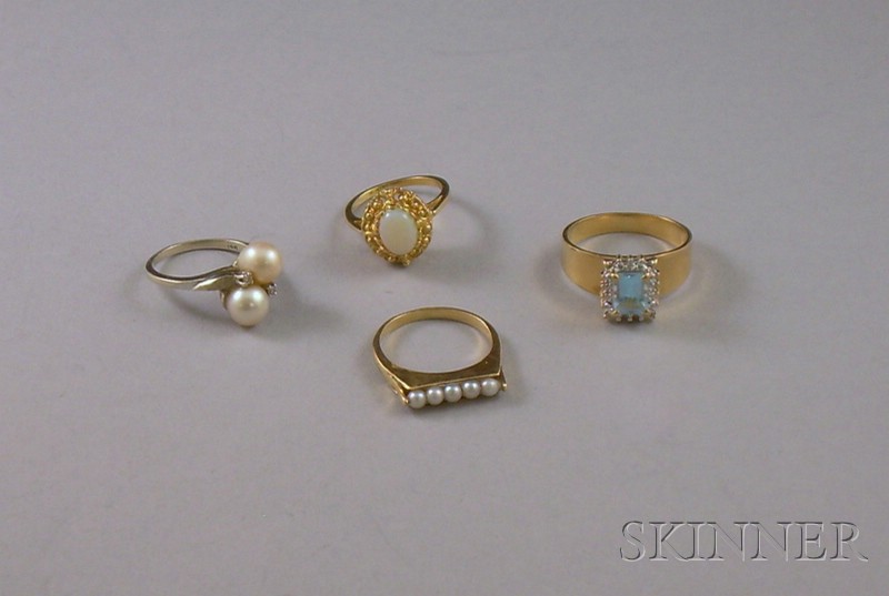 Appraisal: Four kt Gold Rings set with pearls opals and gemstones