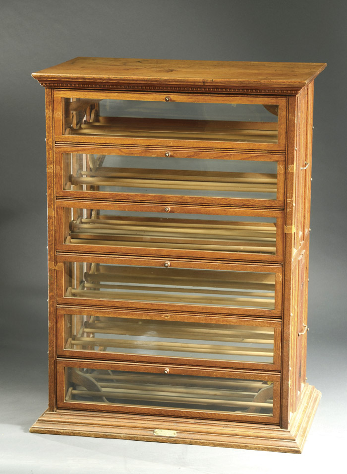 Appraisal: OAK AND GLASS RIBBON CABINET R Lutke Co Portland Oregon