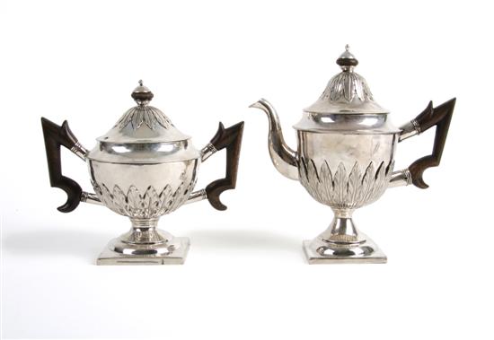 Appraisal: A Russian Sterling Silver Teapot and Sugar Bowl Height of