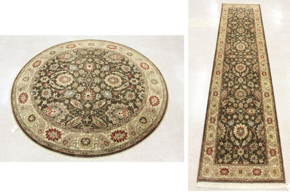 Appraisal: TWO MATCHING HAND KNOTTED ORIENTAL AREA RUGS Pakistani-Persian matching floral