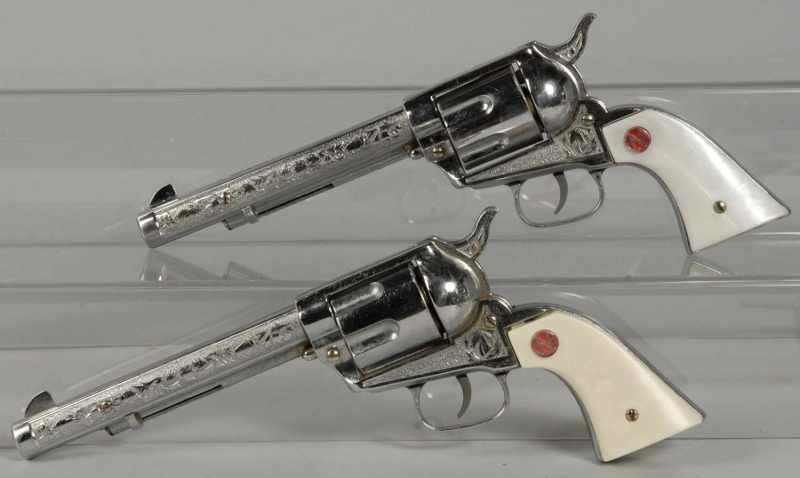 Appraisal: Lot of Nichols Stallion Cap Guns Description Both with bullets