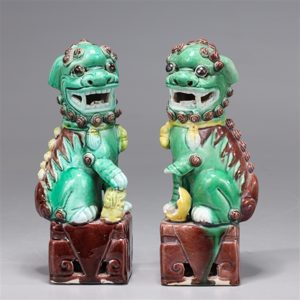 Appraisal: Pair antique Chinese glazed porcelain foo lion circa as-is condition