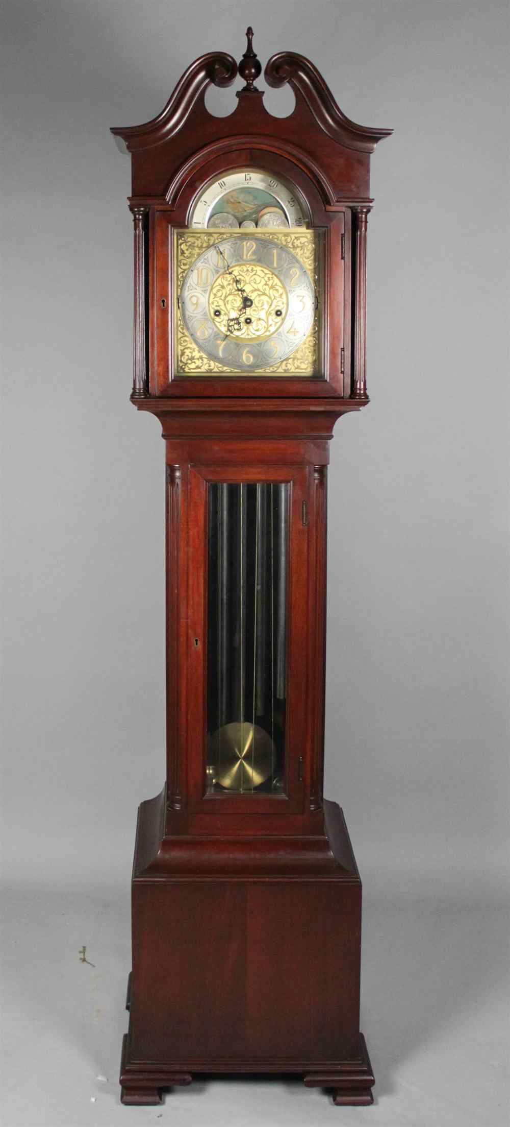 Appraisal: COLONIAL MANUFACTURING CO CHIPPENDALE STYLE MAHOGANY LONGCASE CLOCK the hood