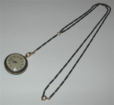 Appraisal: WALTHAM - an open faced fob watch with chain the