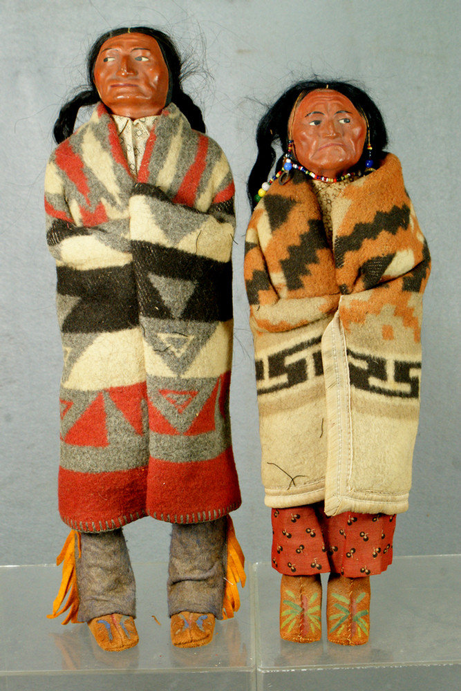 Appraisal: Pr Skookum Native American dolls man and woman one with