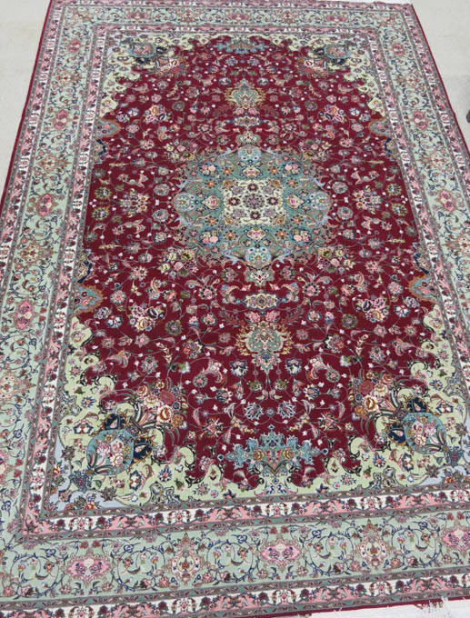 Appraisal: SIGNED PERSIAN SILK WOOL ISFAHAN CARPET hand knotted in a