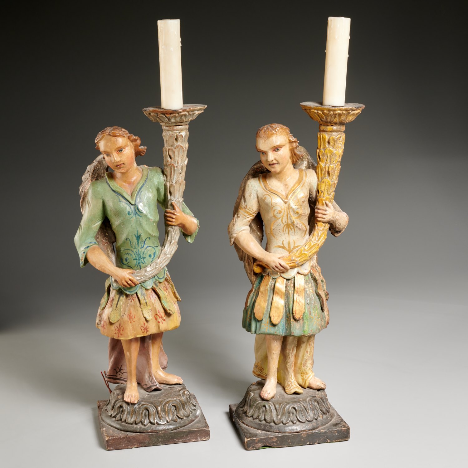 Appraisal: PAIR CONTINENTAL BAROQUE FIGURAL CANDLE HOLDERS th th c carved