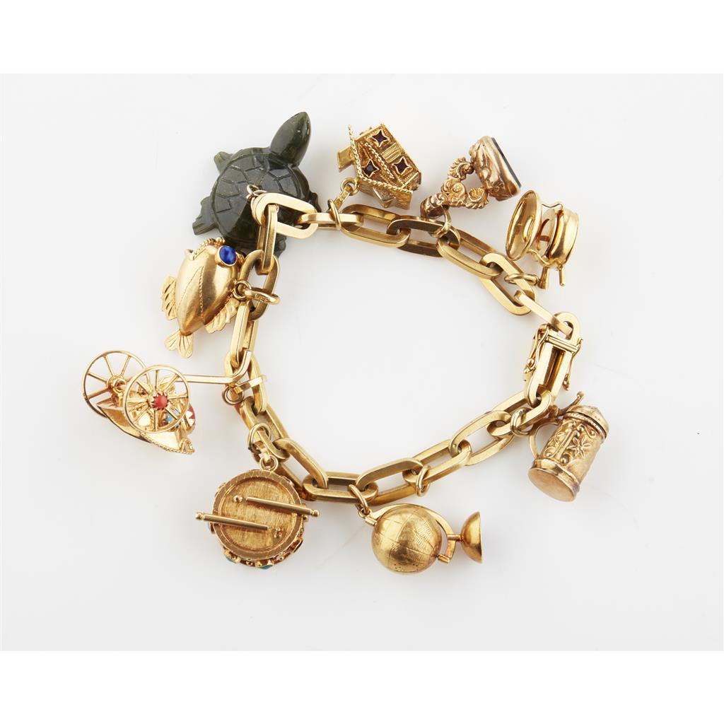 Appraisal: A multi-gem set charm bracelet composed of thick belcher links