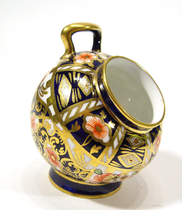 Appraisal: Royal Crown Derby squat vase painted with Imari style flowers