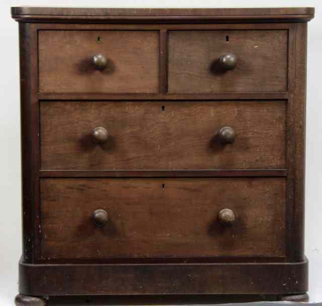 Appraisal: A Victorian chest of two short over two long drawers