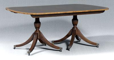 Appraisal: Regency style two-pedestal dining table mahogany top with banded edge