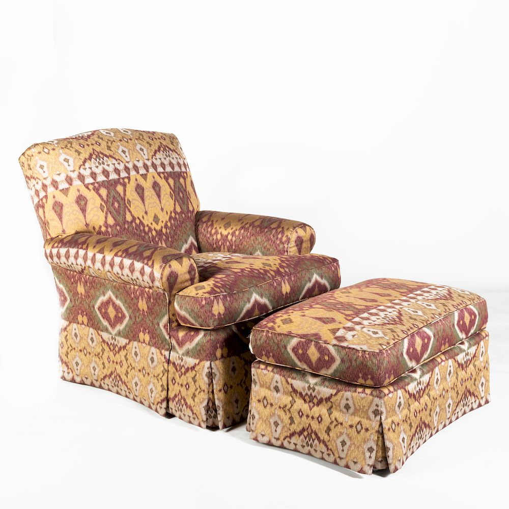 Appraisal: Upholstered Club Swivel Chair and Matching Ottoman The ottoman with