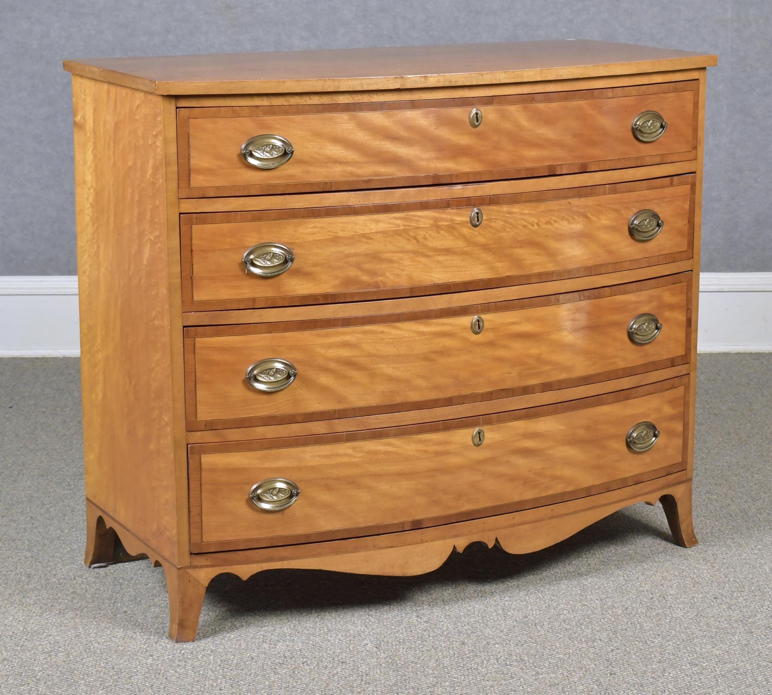 Appraisal: TH C HEPPLEWHITE BOW-FRONT FLAME BIRCH CHEST A ca American