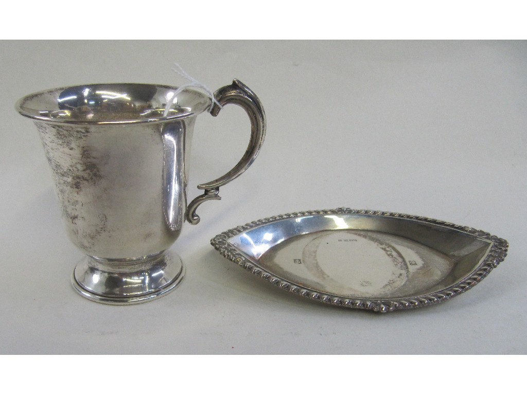 Appraisal: Lot comprising silver christening mug and silver dish Birmingham and